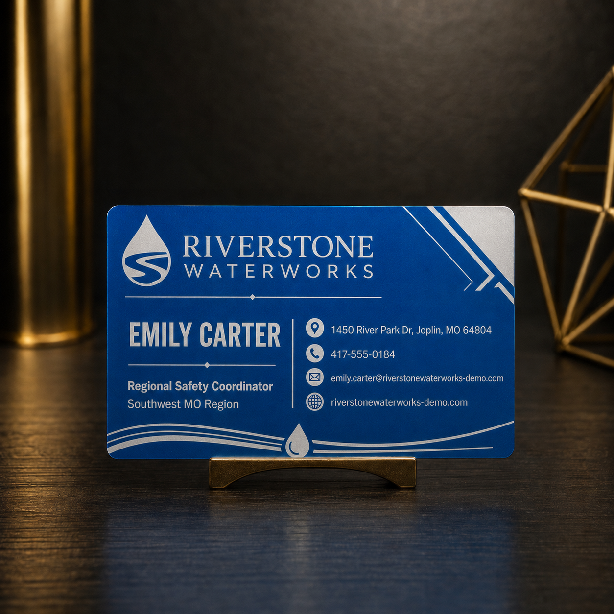 Engraved metal business card for Riverstone Waterworks